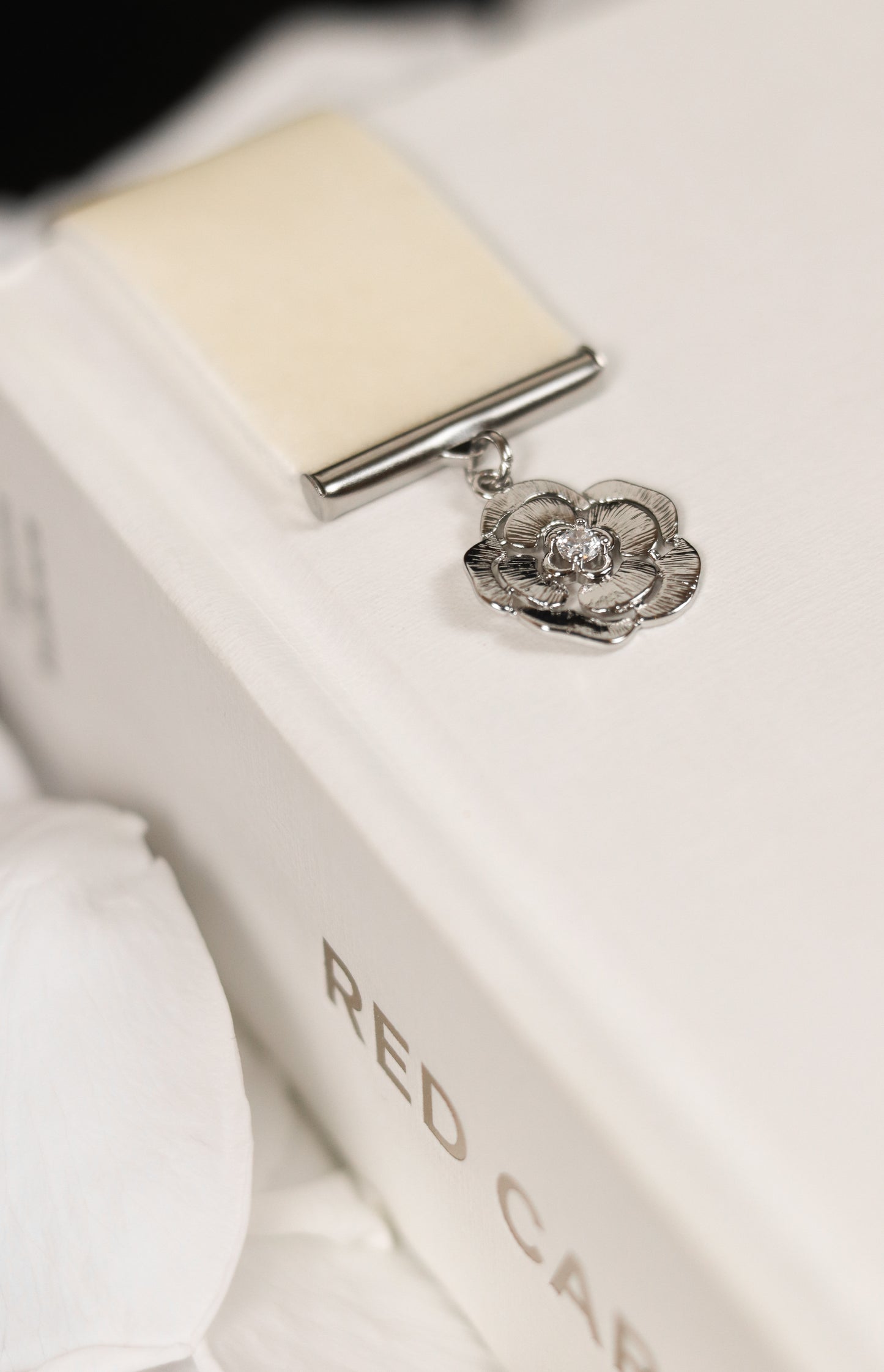 Camilia boekenlegger zilver